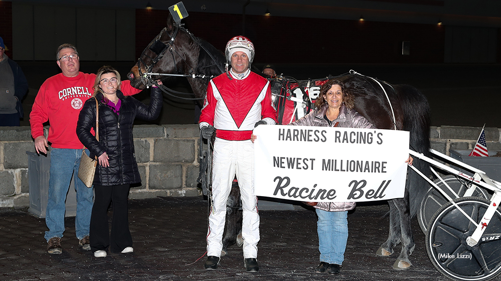 Racine Bell feted in the Yonkers winner's circle for reaching the $1 million mark in career earnings